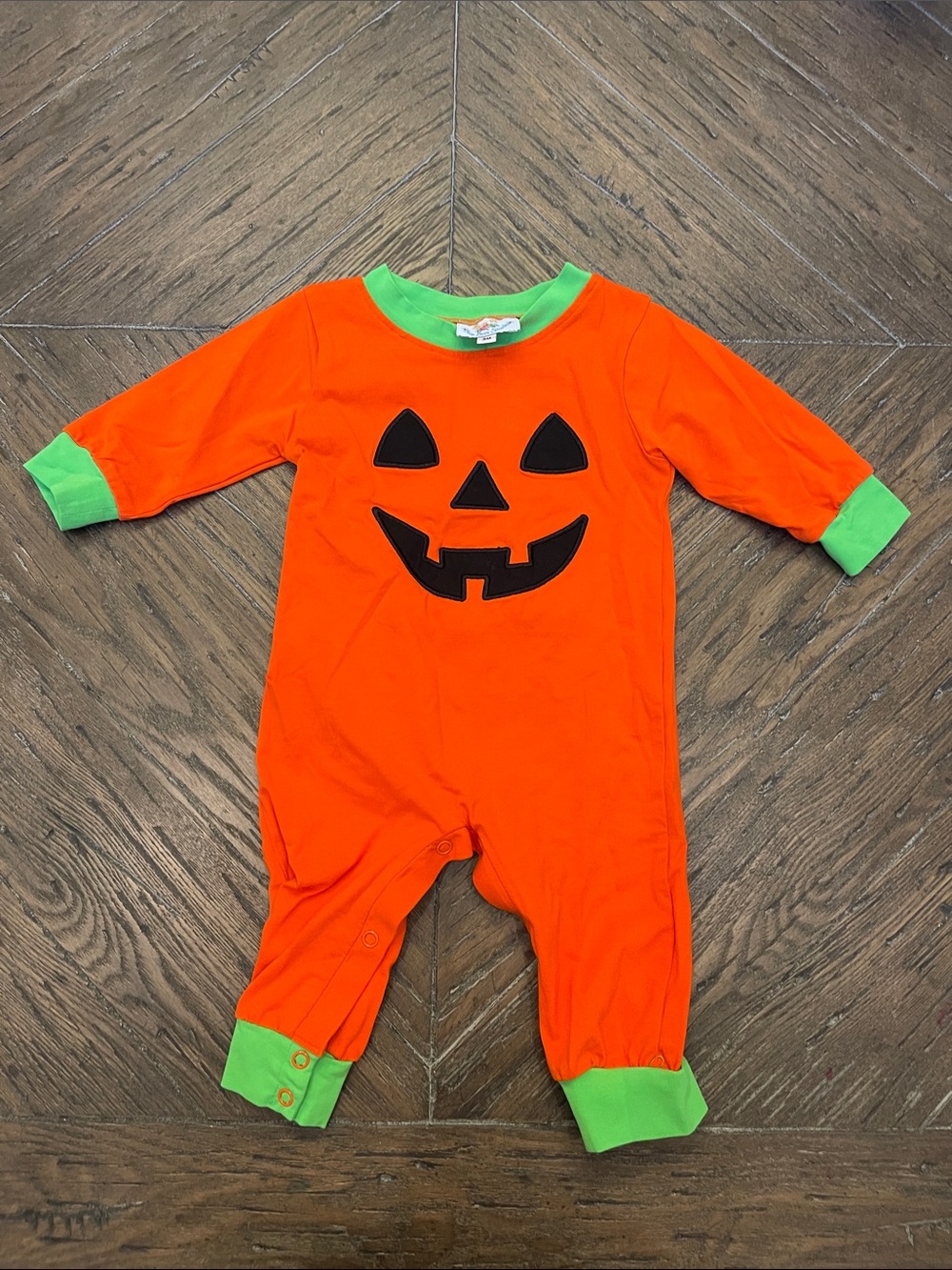 Busy Bees Smocks Orange Pumpkin Jack-O'-Lantern One-Piece Romper